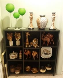 wooden animals, black storage cabinet