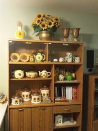 storage cabinets, sunflower canister sets, teapots, cups/saucers, clock, cookbooks