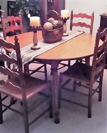 Dining table with leaves up and 4 chairs