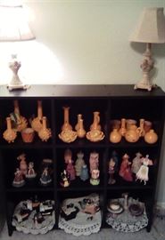 black storage cabinet, sewing teapots, trinkets
