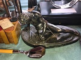 Statue Of Man With Sword And Snake