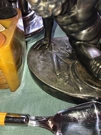 Statue Of Man With Sword And Snake