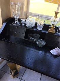 Crystal pieces on black secretary desk