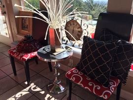 Black chairs with red upholstery seats! 