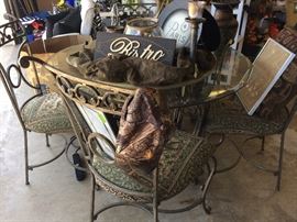 Glass top with heavy metal base and chairs