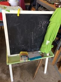 Childs chalk board, paint easel, and green umbrella 