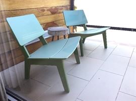 Loll Lago Green Outdoor Lounge Chairs (4). Tree Stump Tables (2).