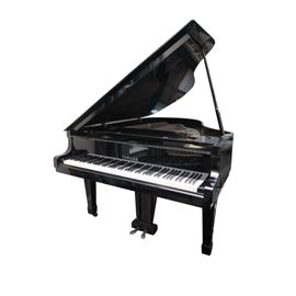 Black Yamaha Grand Piano and Bench: A black Yamaha grand piano, serial number B 2163920, marked “Yamaha Piano, Nippon Gakki, Hamamatsi, Japan”. Please note that middle sostenuto pedal is not included. A matching black tufted bench is included.