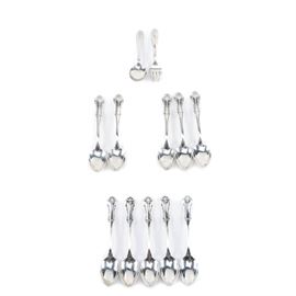 "Joan of Arc" Sterling Silver Flatware by International Silver and More: An assortment of sterling flatware. This includes ten teaspoons in the Joan of Arc pattern by International Silver Co. along with a Frank M. Whiting monogrammed baby set in the Adams pattern with a spoon and fork with “G” to the handles. The undersides are etched, “J. Thomas III” to the undersides. The total approximate weight is 10.775 ozt.