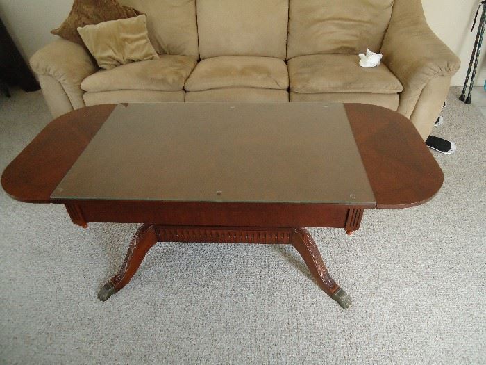 This is a beauty.  Drop leaf coffee, cocktail table , sit on the floor dining table (:  Duncan Phyfe Antique.  Has drawer on the other side. For its age in excellent condition.  