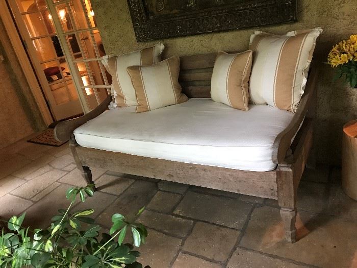 Antique wooden bench upholstered