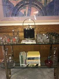 Brass and glass sofa table, vintage glasses, decanters
