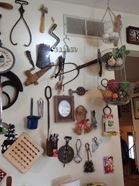 VINTAGE GADGETS THERE ARE WALL FULL OF OLD COOKING UTENSILS