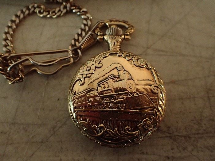 STORYLINE GOLD POCKET WATCH WITH CHAIN
EMBOSSED WITH TRAIN