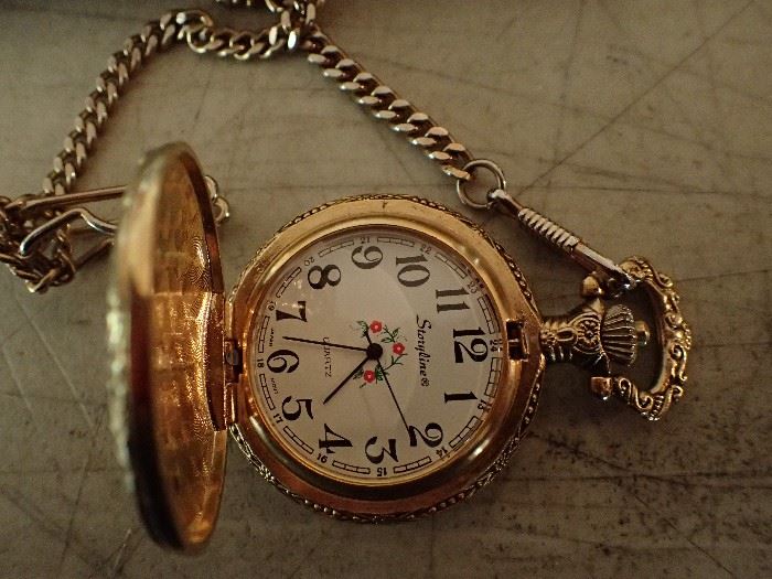 STORYLINE GOLD POCKET WATCH WITH CHAIN
EMBOSSED WITH TRAIN
