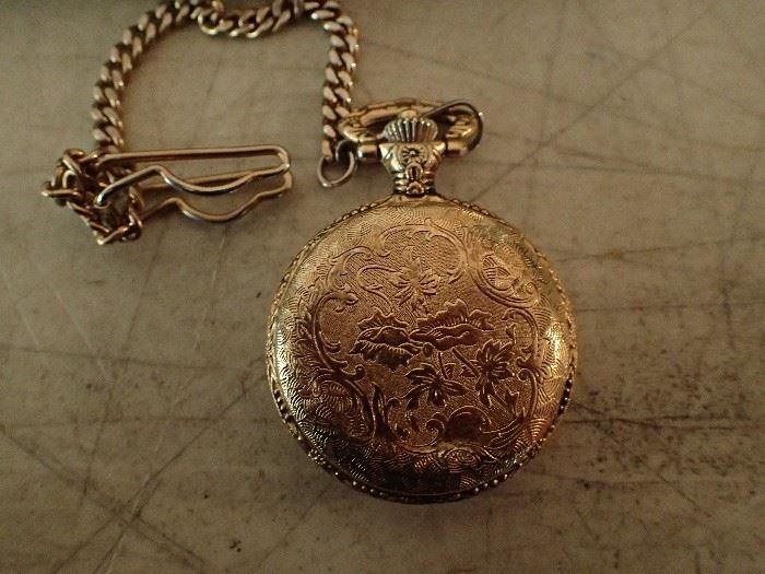 STORYLINE GOLD POCKET WATCH WITH CHAIN
EMBOSSED WITH TRAIN & FLORAL 
