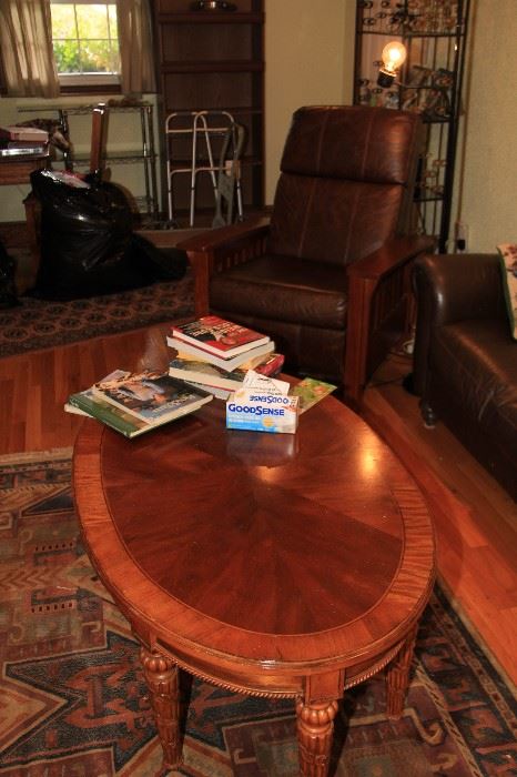 side table, rug, leather reclining chair
