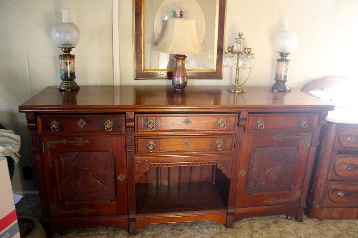 Large credenza with intricately carved doors. 6'6" length, 2' depth, 3' height - $1950.00