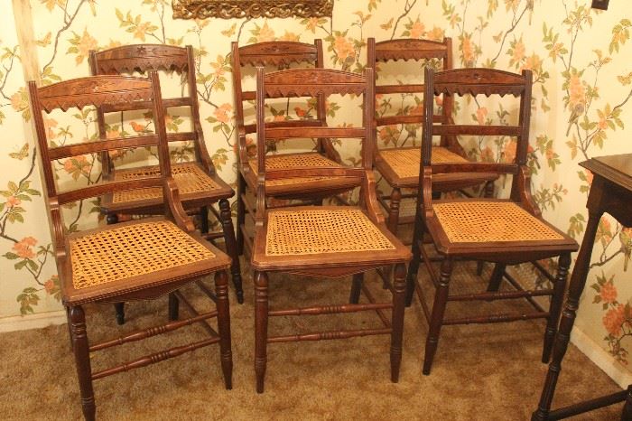 Wooden chairs set of 6 with cane seats $300.00