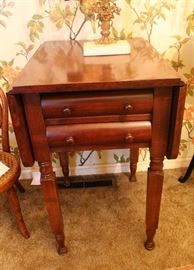 Drop leaf, two drawer table $150.00
