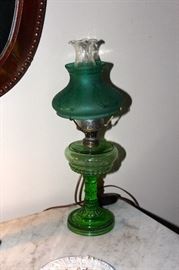 One of a pair of green oil lamps-electrified $275.00