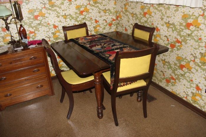 Mahogany table and chairs with leather seats, CA.1941 $395.00