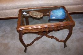 Glass top wooden coffee table