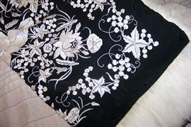 Beautifully embroidered throw with fur trim