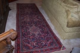 Beautiful oriental rug - measures 9'5" by 36" wide