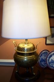 These are wonderful brass lamps - there is a pair - both located in the den.