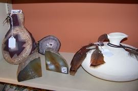 Pottery:  Extreme left:  by Arizona artist Steven Kaye;  White pottery on the right is by E. Cole (1995)