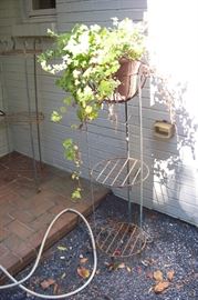 Several pieces of iron stands in the yard