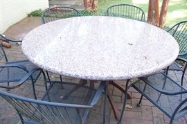 Custom made iron base table with granite top