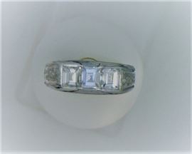 Platinum hand engraved 1.50 ct band - emerald cut diamonds