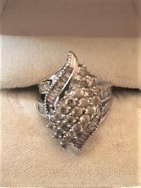 14K white gold with found and baguette diamonds