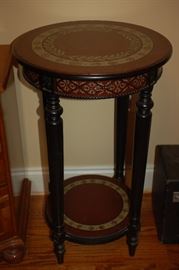 Large ornate round wood display table