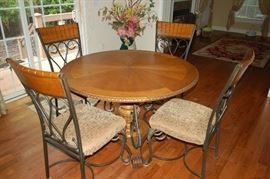 Kitchen table with four metal chairs