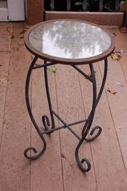 Glass top wrought iron table