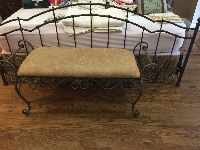 Iron bench with cushion