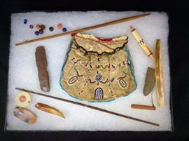 Beaded band and other implements