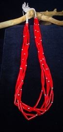 Multi Strand red bead necklace