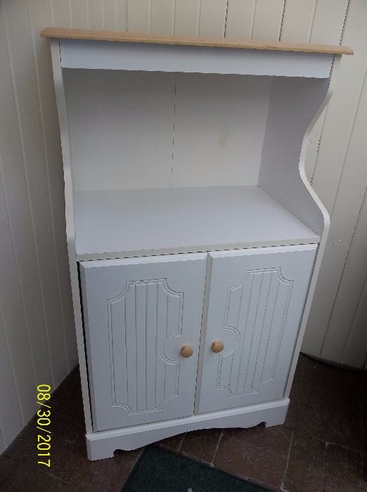 white microwave cabinet