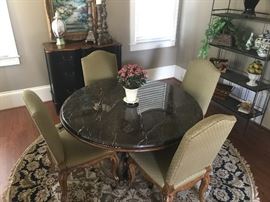 Drexel Heritage Round Marble Topped Table, 4 Upholstered Chairs, Round Rug. Table: 54" dia., 30" h. Chairs: 22" l, 23" d, 41" h. Rug: 100" dia.