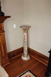 Pair of pink marble pedestals (one of two)