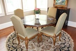 Drexel Heritage Round Marble Topped Table, 4 Upholstered Chairs, Round Rug. Table: 54" dia., 30" h. Chairs: 22" l, 23" d, 41" h. Rug: 100" dia.