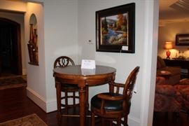 Round High-topped pub table and barstools
