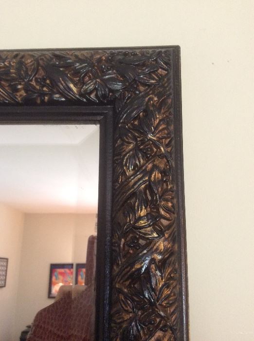 Detail, carved frame floor mirror