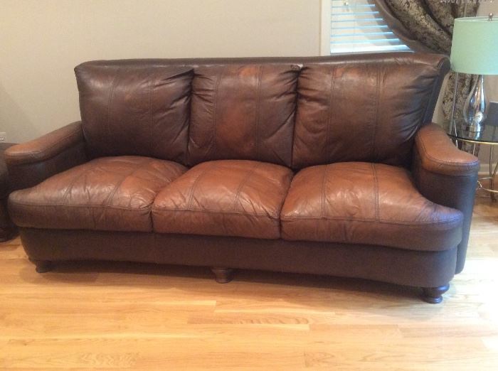 Bun footed leather sofa