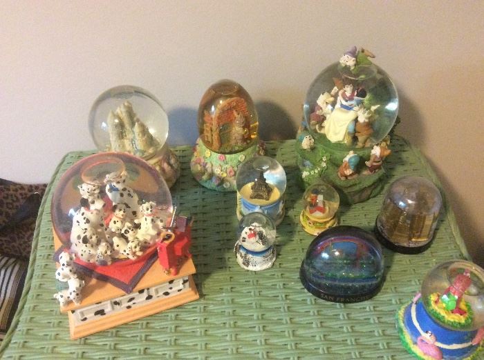 Snow globe collection, including Disney collectible musical snow globes