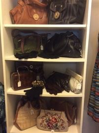 Designer handbags, including styles by Coach, Cole Haan, Kooba, Ferragamo
